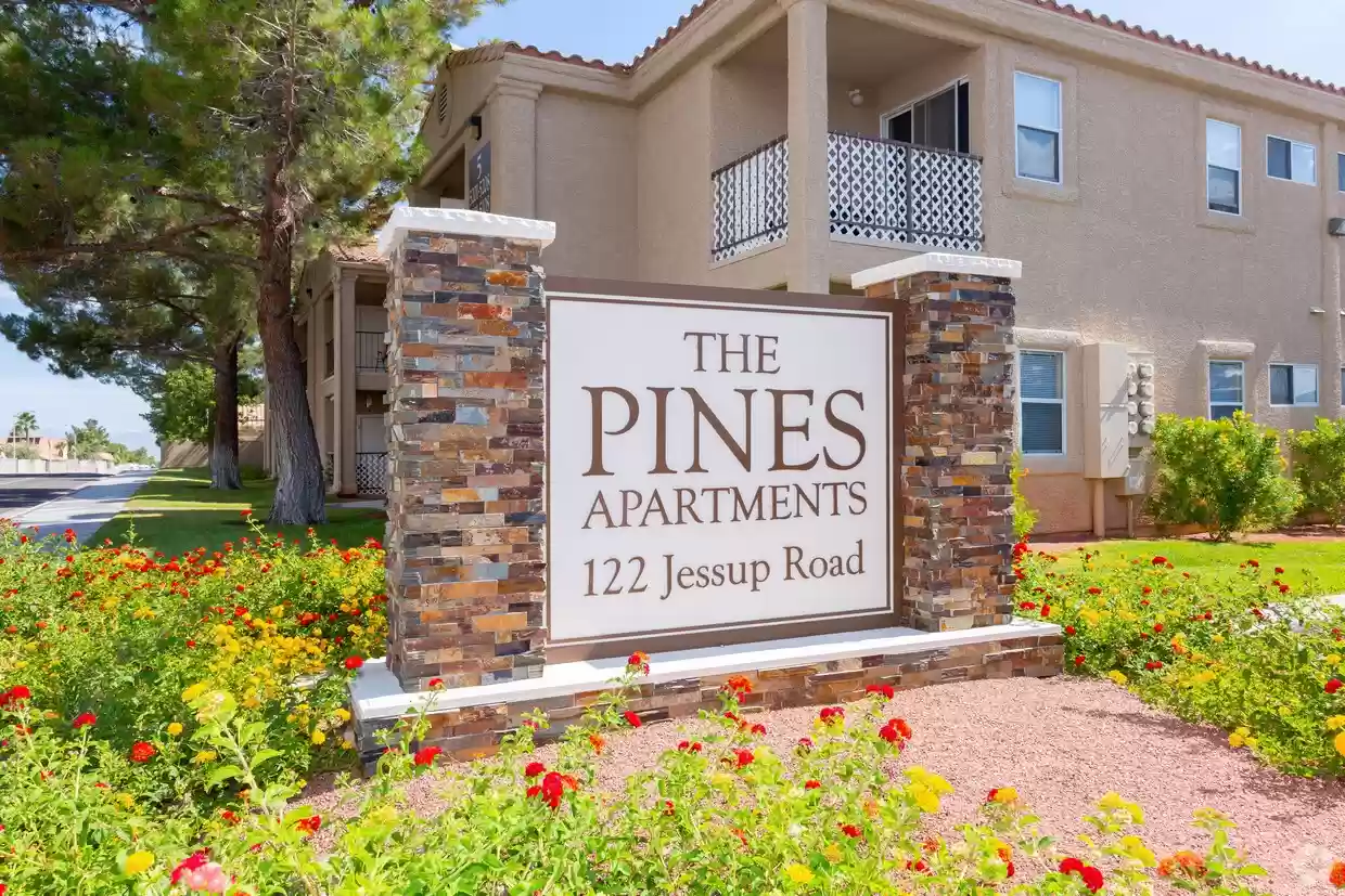 Pines Apartments complex sign, Exterior